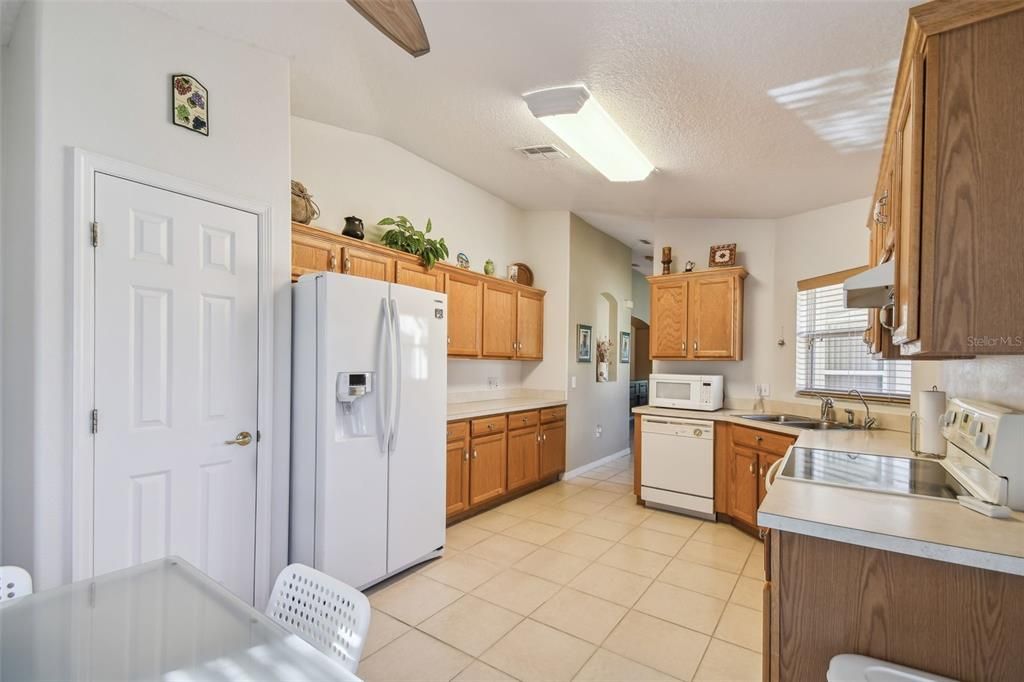 Shelved pantry; double door refrigerator