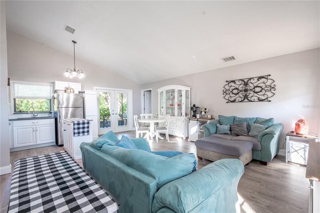 French doors lead to the screen in patio/lanai.