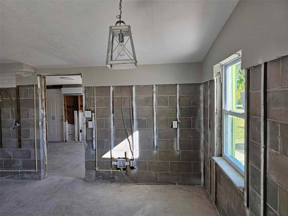 kitchen area where refrigerator goes with water line