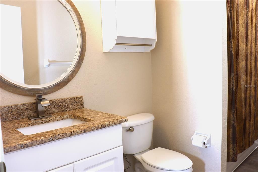 Guest Bathroom with granite countertops