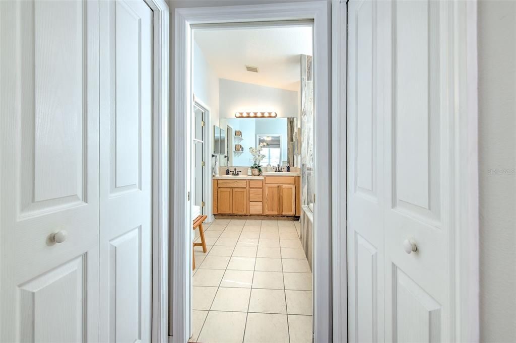 Primary Bedroom with dual walk-in closets