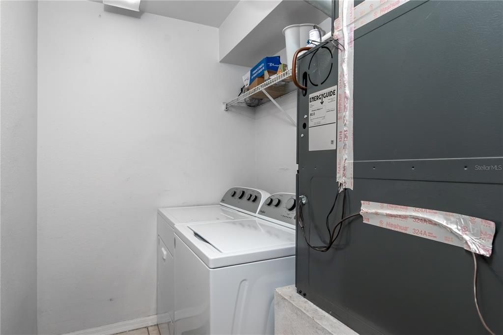 Laundry Room with Washer & Dryer and Newer HVAC