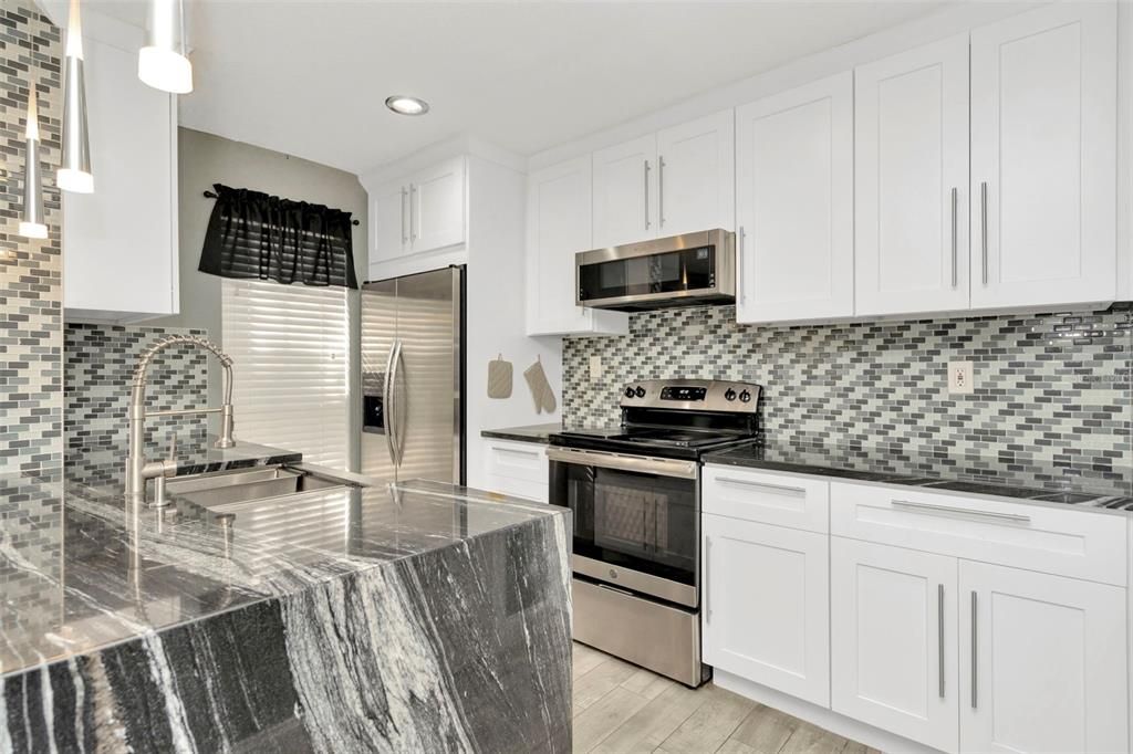 Kitchen with waterfall countertop