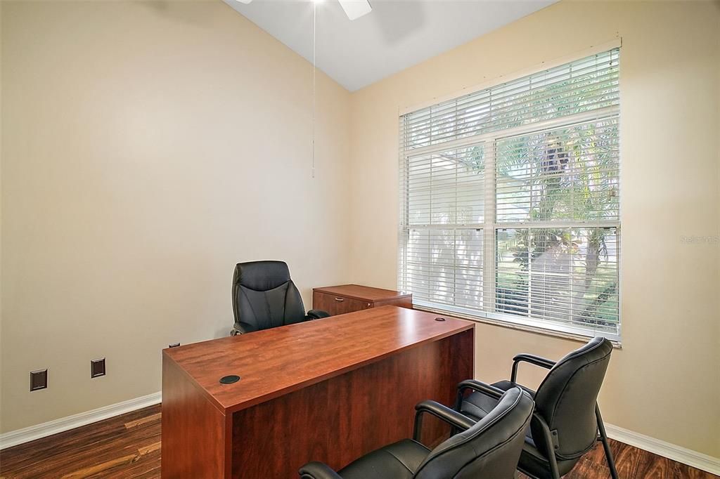 Large window in Den/study overlooks front yard