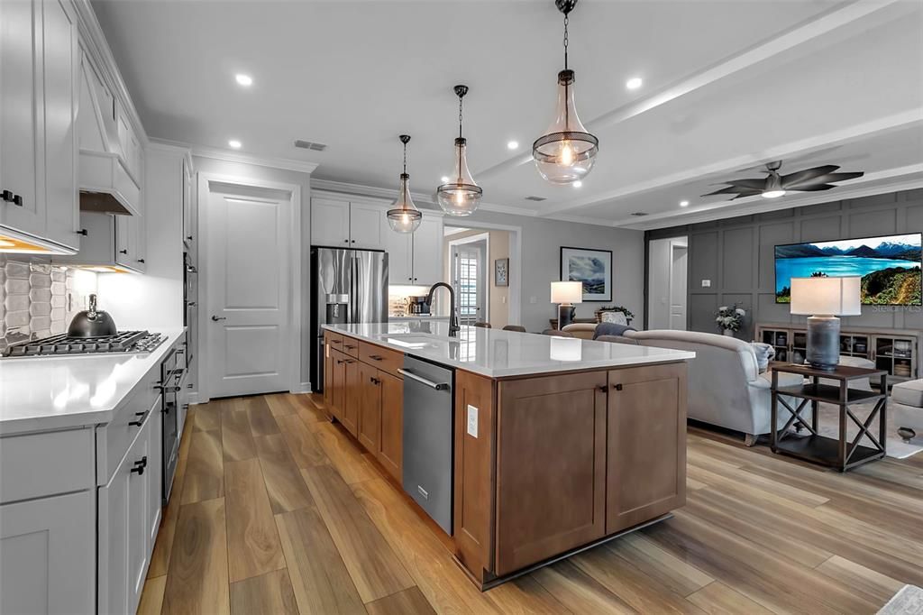 Gas stove top has the 2nd oven below- door leads to large walk in pantry