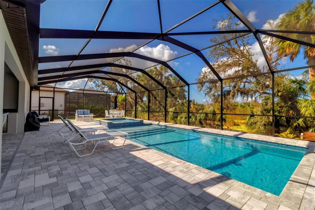 Saltwater, heated pool and spa with a sun shelf. Spectacular, private view of Old oaks with hanging moss. Welcome Home!