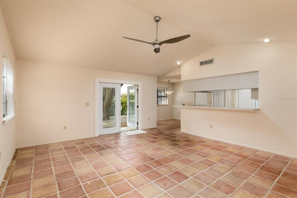 Openness to the kitchen and Double French doors to the backyard