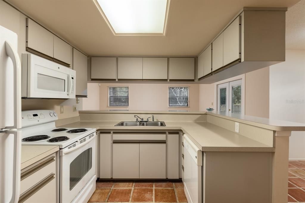 Neutral colored cabinets and a functional lay out