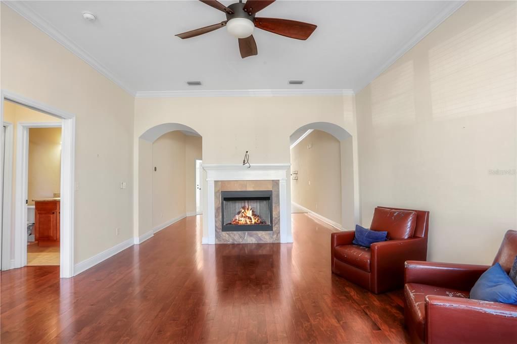 Living room features a gas fireplace.