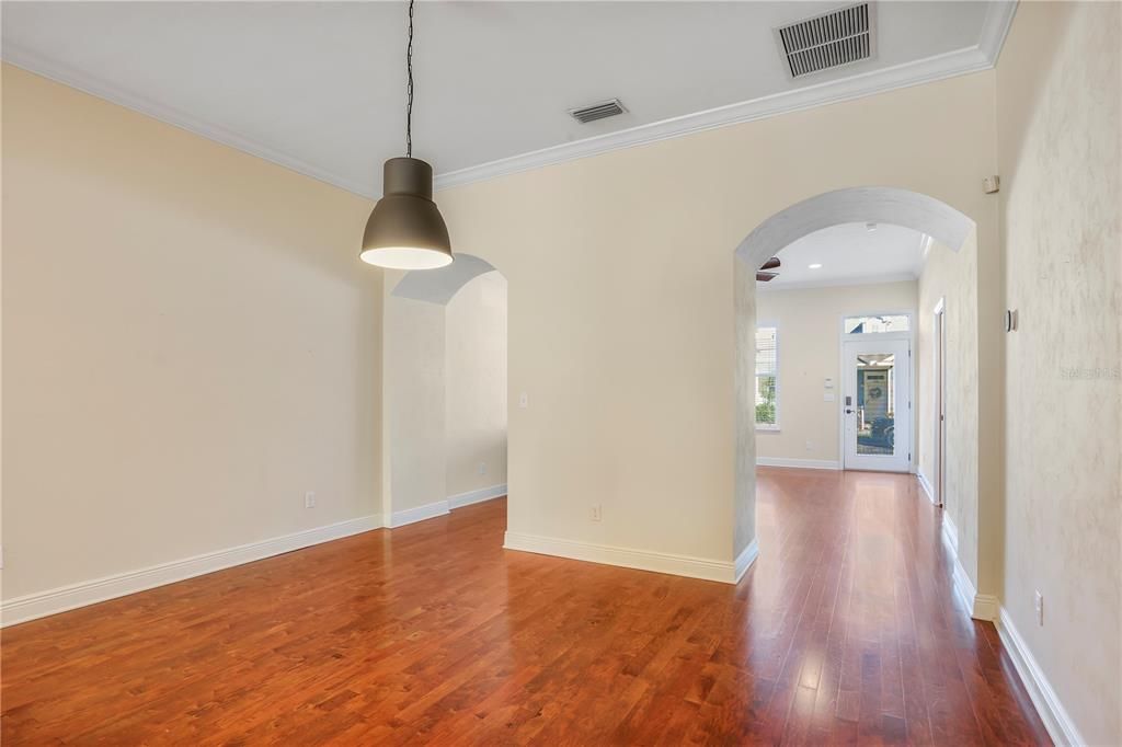 Gorgeous archways, elevated ceilings, and crown molding provide for a sophisticated look and feel.