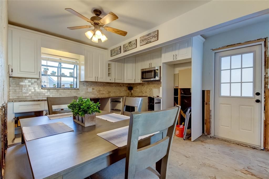 Kitchen showing Entry Door