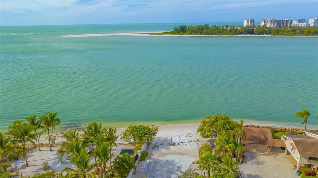 Shell Beach overlooks Big Pass and Lido Beach. Perfect for sunning and legendary sunsets Located 0.2 miles from your door.