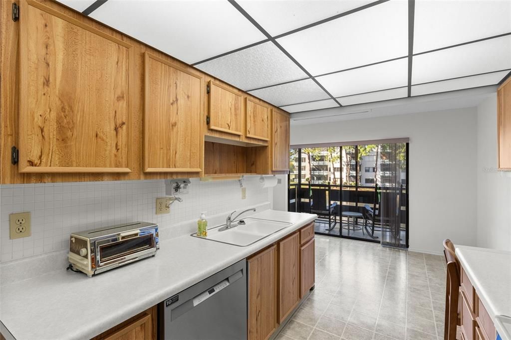 kitchen looking into screened balcony