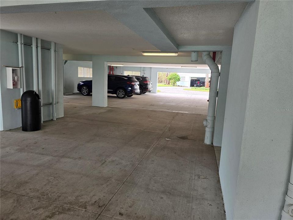 Under building parking with private car charging outlet for unit