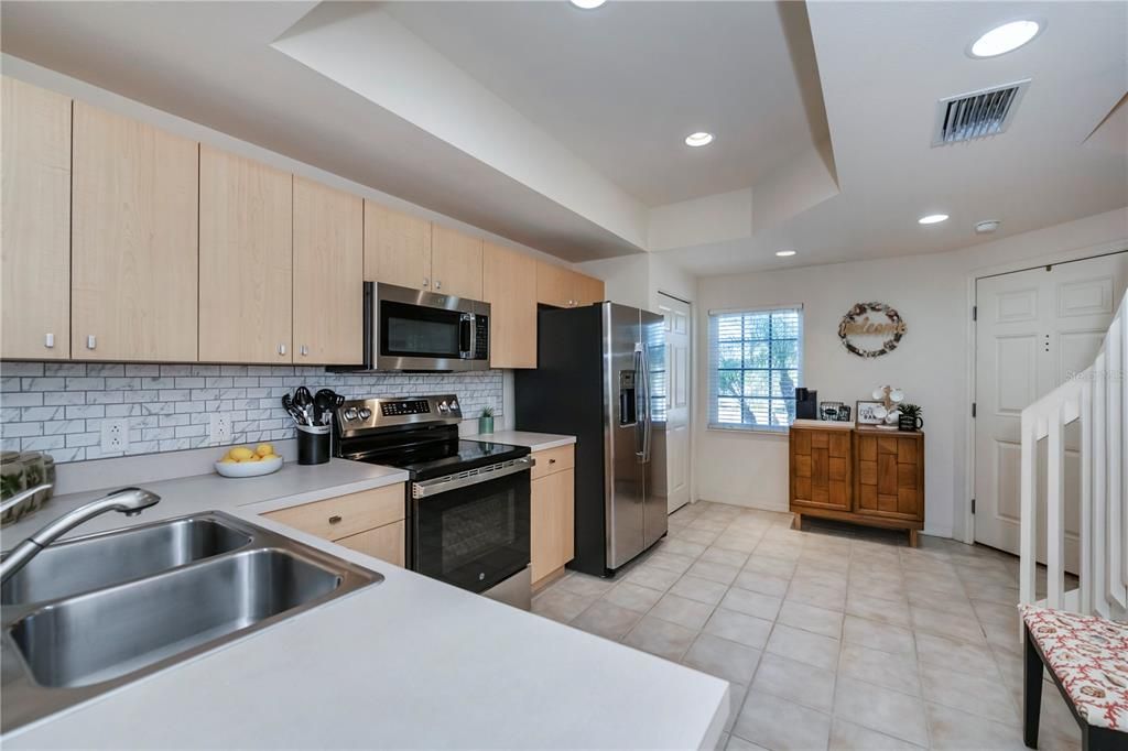 coffered ceiling with all new stainless appliances