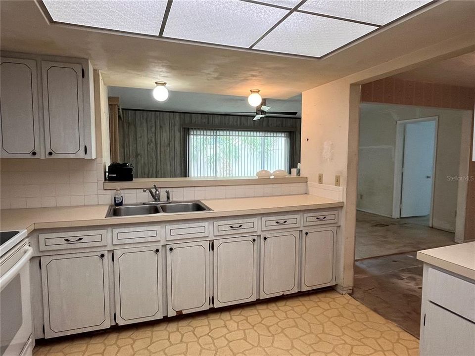 Kitchen with opening to family room