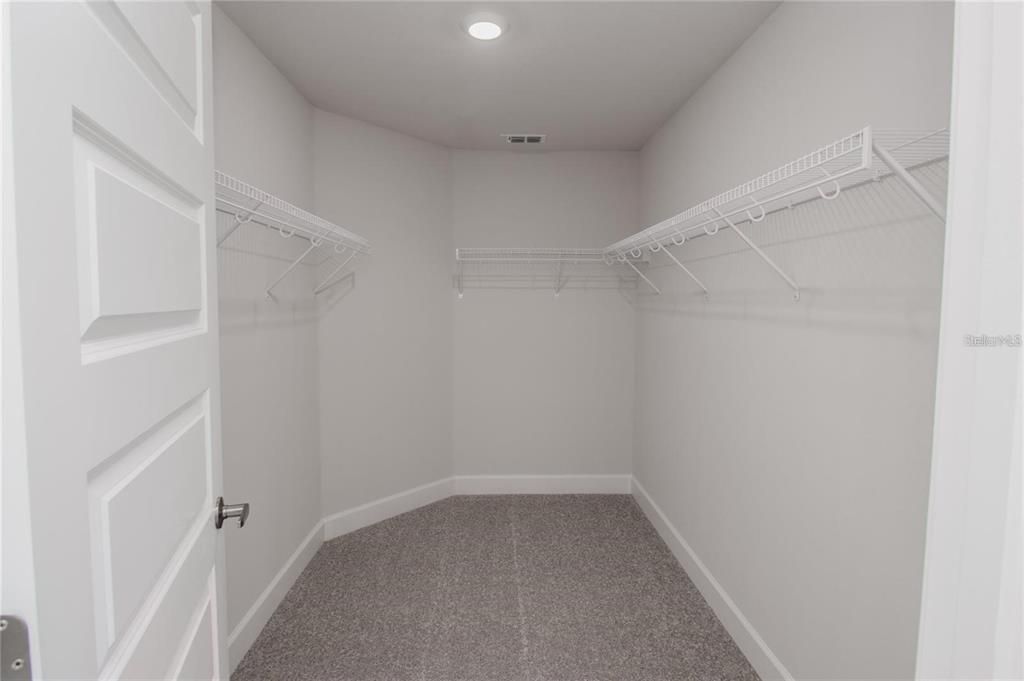 SAMPLE PRIMARY WALKIN CLOSET