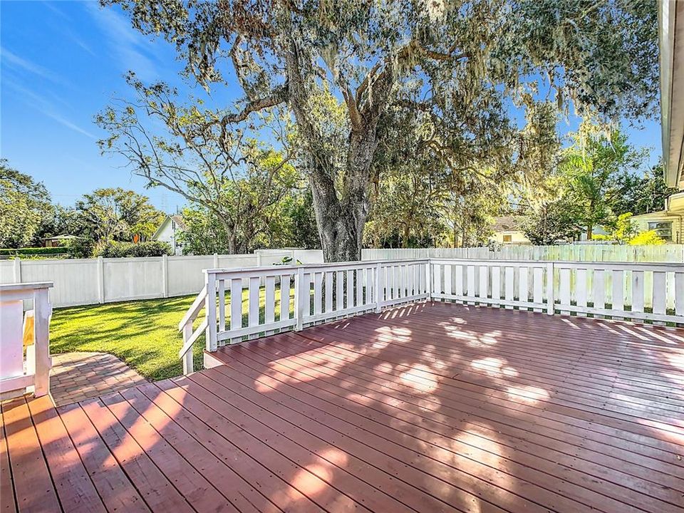 Deck overlooking large yard