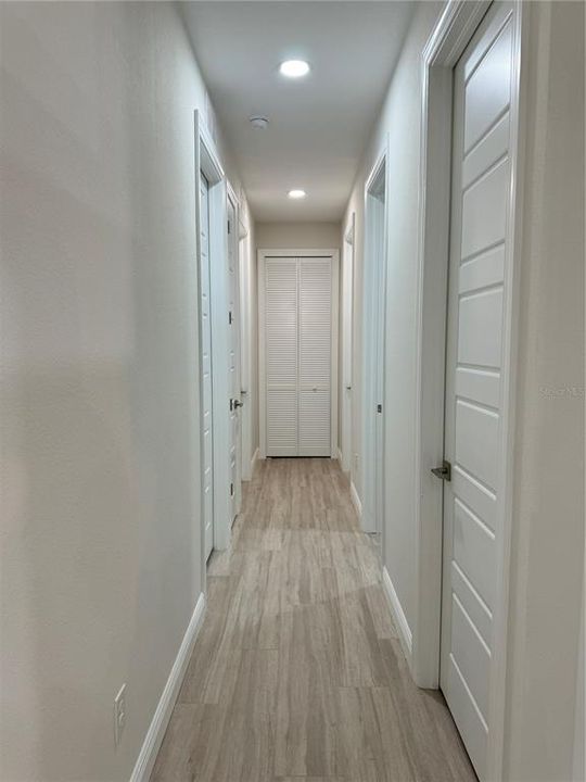 Hallway to Bedrooms 1 & 2, Linen Closet, Pantry & Laundry Room