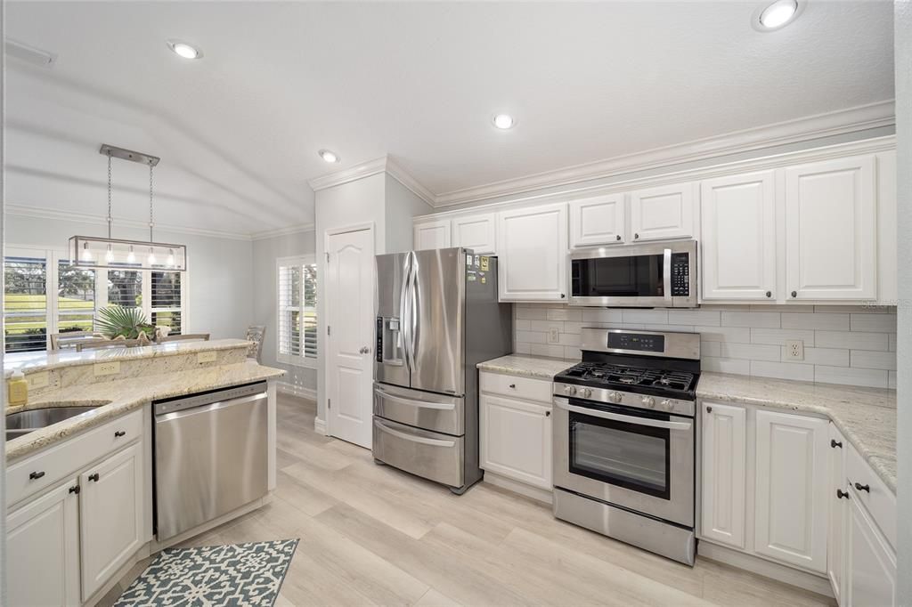 Granite, Stainless appliances beautiful backsplash make this kitchen special