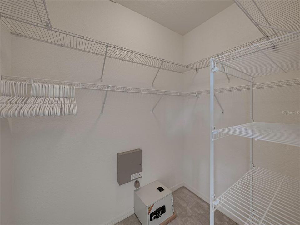 Walk in closet from primary bedroom