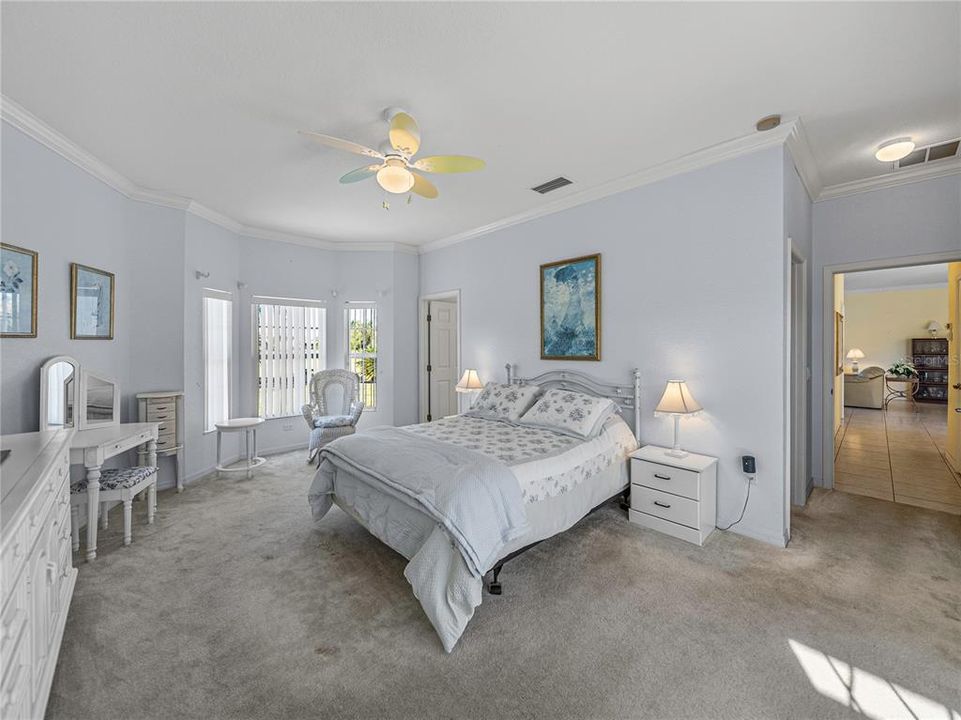 Primary bedroom with lots of natural lighting