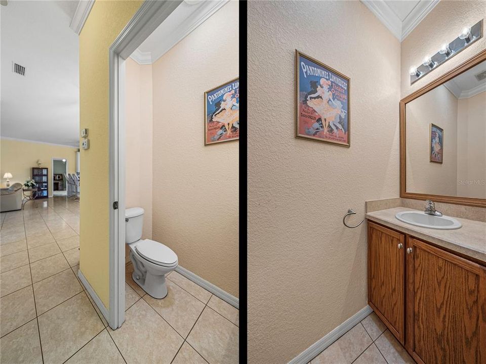 Half bathroom in hallway across from guest bedroom