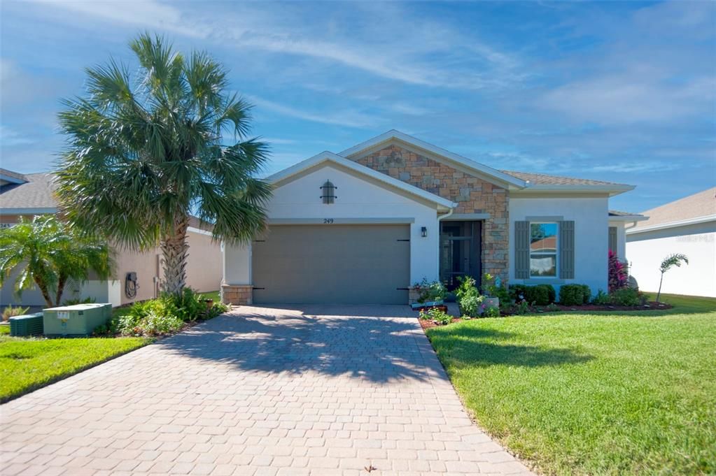 This popular CABELLA floor plan has a stacked stone facade