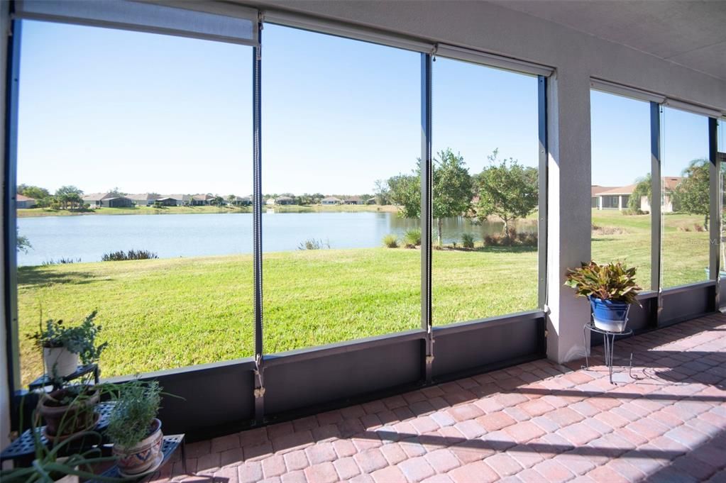 THIS is the reason you'll love this home...the VIEW! In the lanai, even the screened panels have pull down roller shades