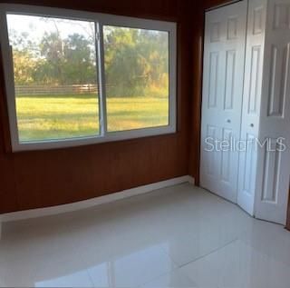 Room adjacent to the primary bedroom with two built-in closets. Use your imagination!