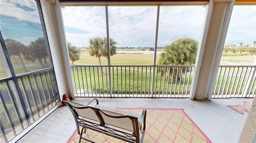 Screened & Roof lanai overlooking Twin Isles Golf Course