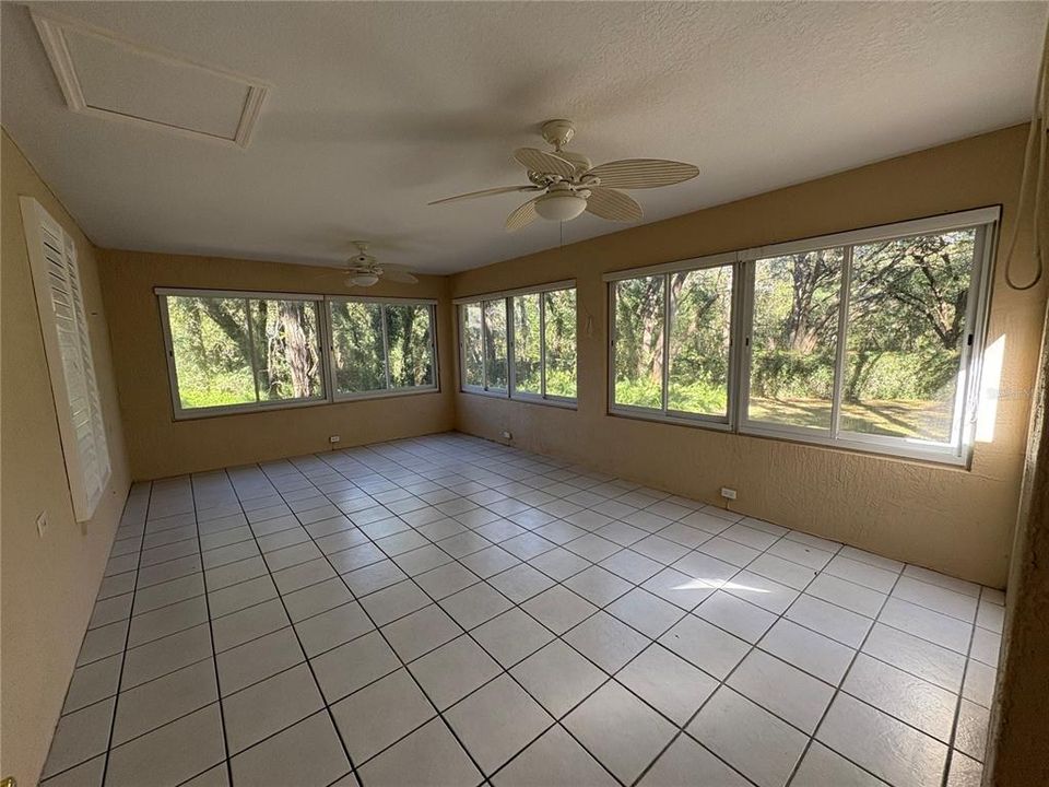 Beautiful Florida room overlooks the yard