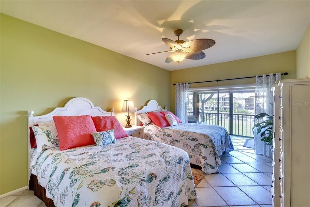 @nd bedroom with Access to lanai and beautiful water views.