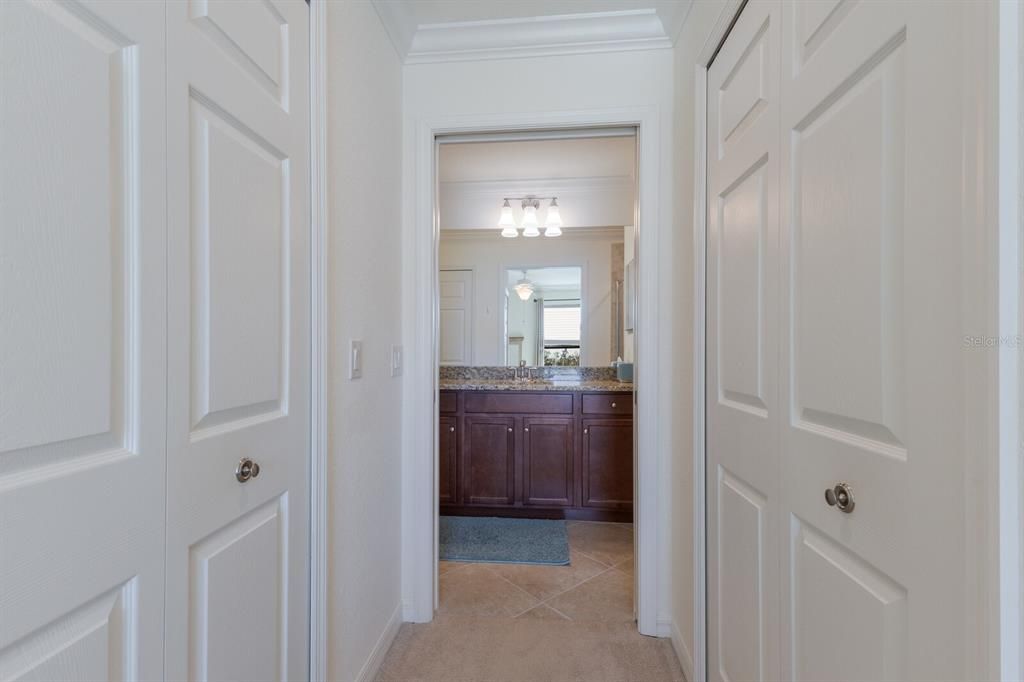 Primary Bedroom with 2 Walk-In Closets and an enSuite bath with Step in Shower