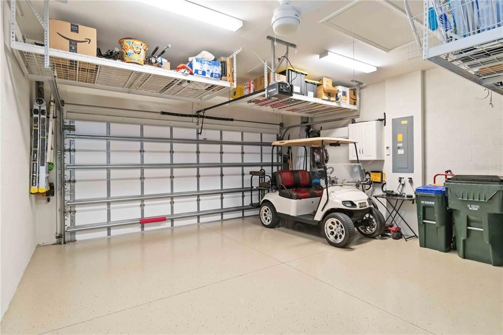 Garage with storage and brand new epoxy floors