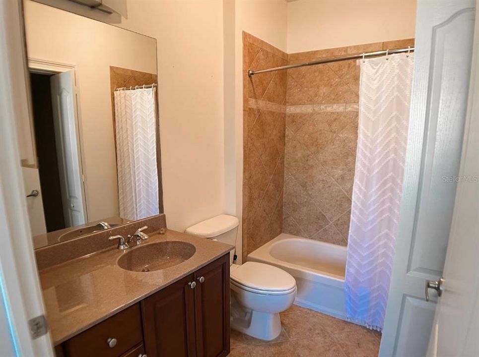 En-suite bathroom with walk-in closet Bedroom 1