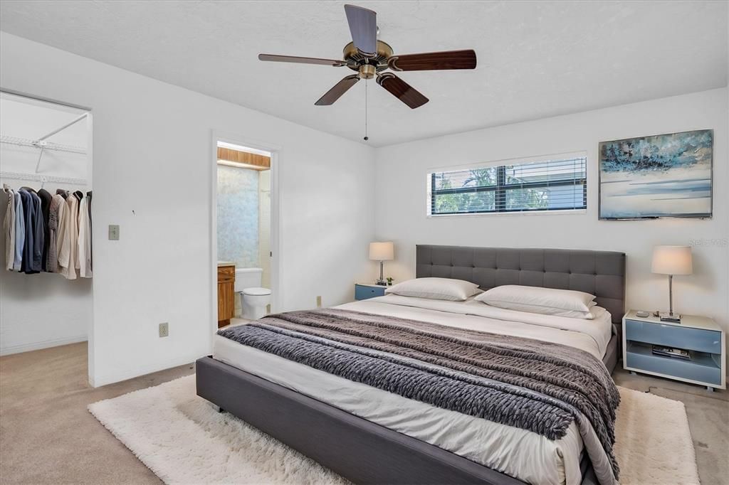 Primary bedroom with En-suite bath and walk in closet