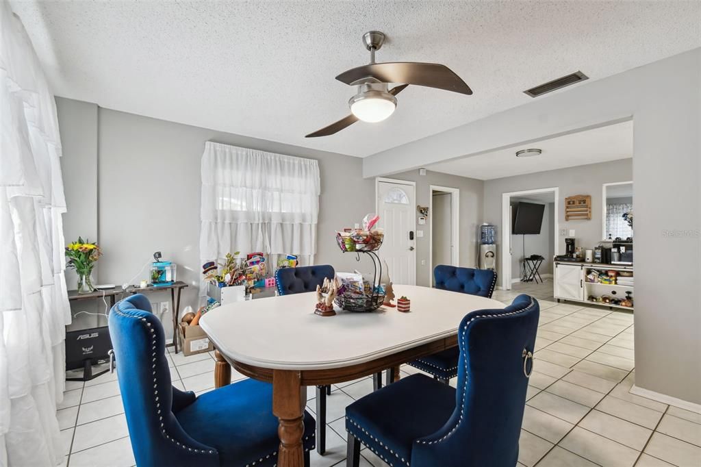 Dining room with access through to the kitchen.