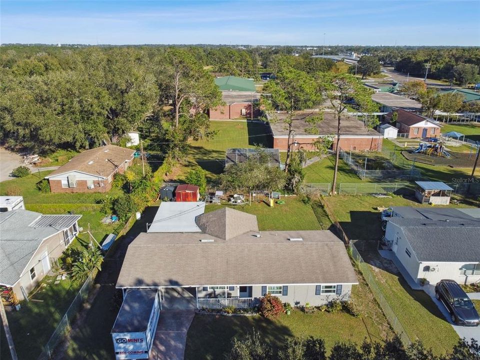 Aerial view of the home and neighbors.