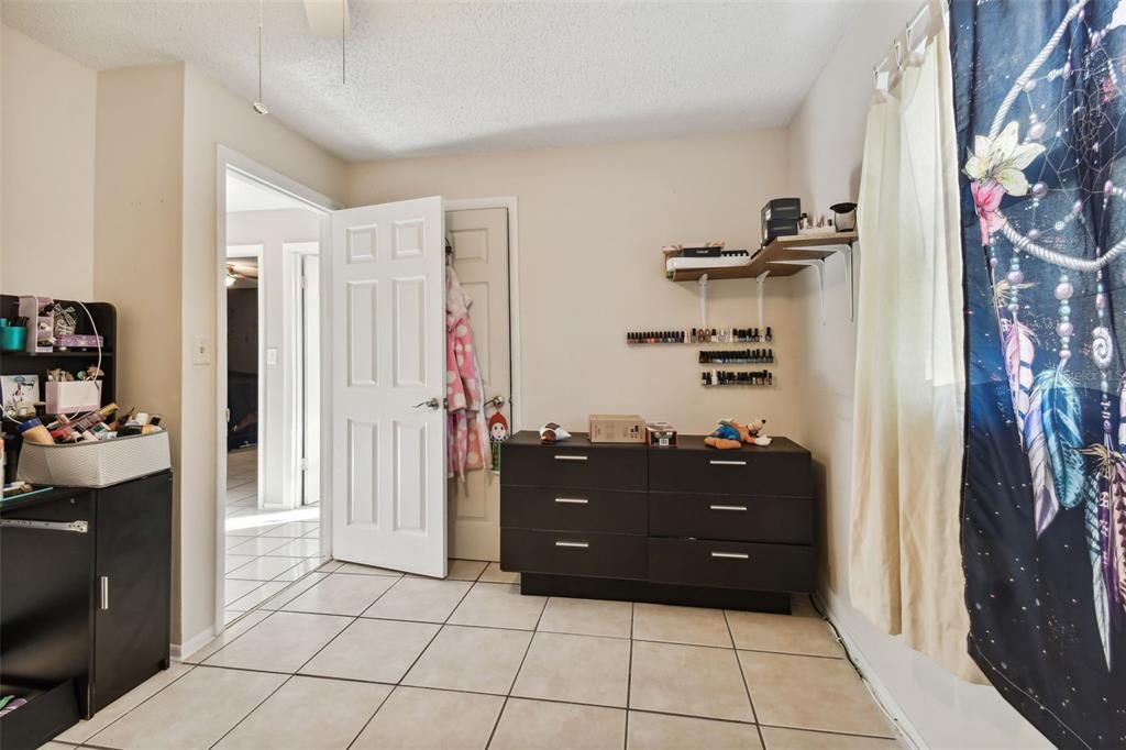 Bedroom adjacent to the bathroom.