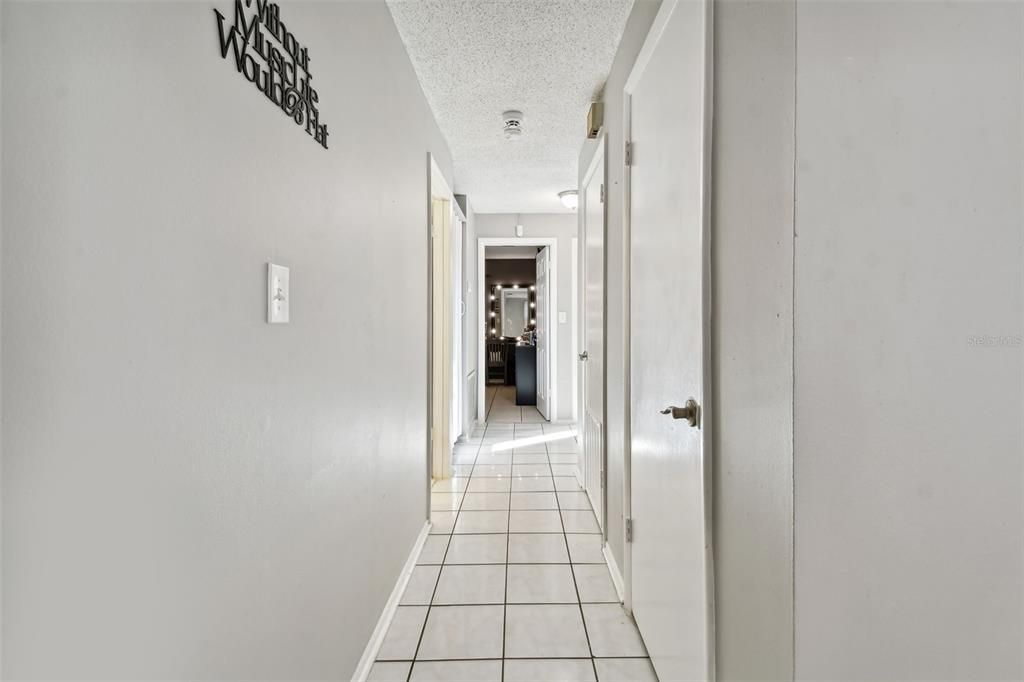 Hallway to bedrooms and bathroom.