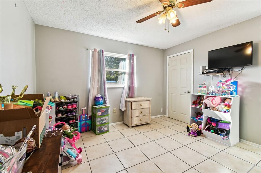 Bedroom with walk-in closet.