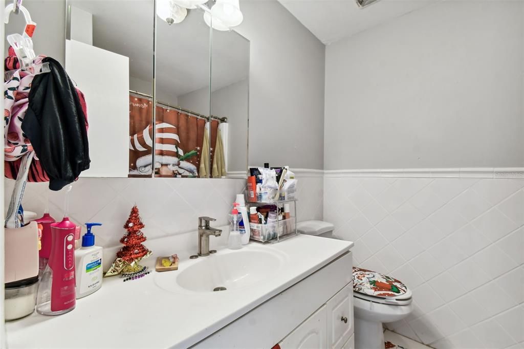 Bathroom with sink and tub.