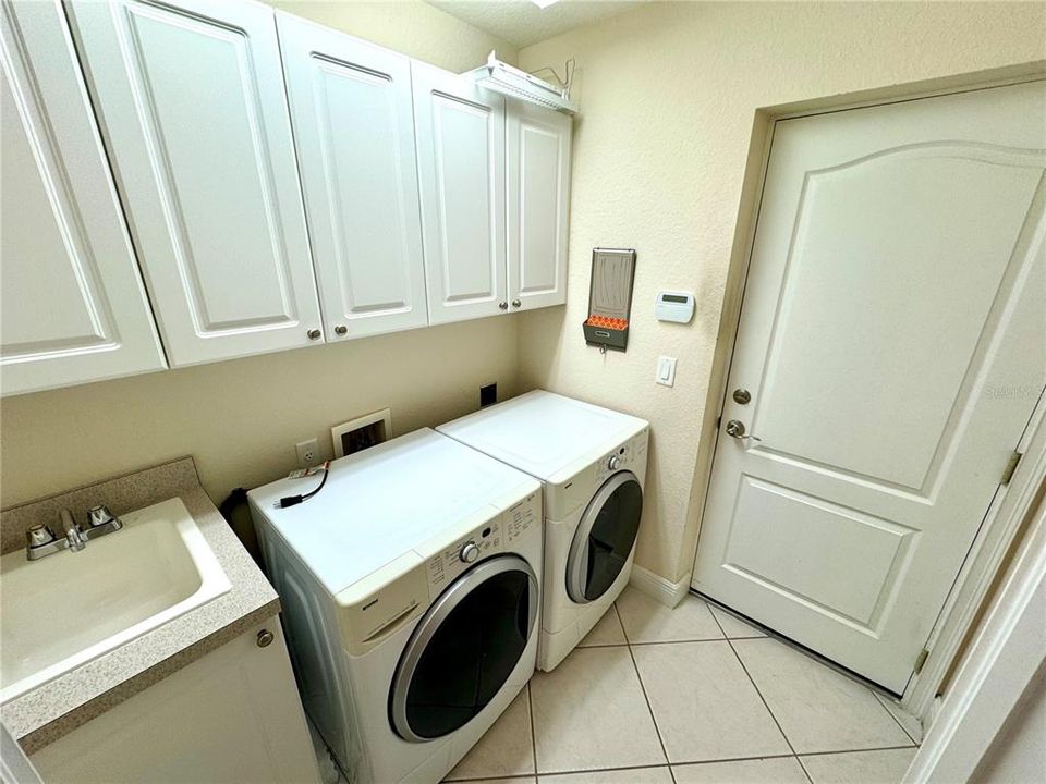 Inside laundry room just off the 2 car garage