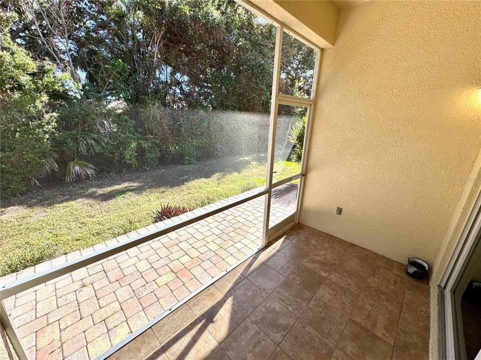 Rear patio overlooking a green space