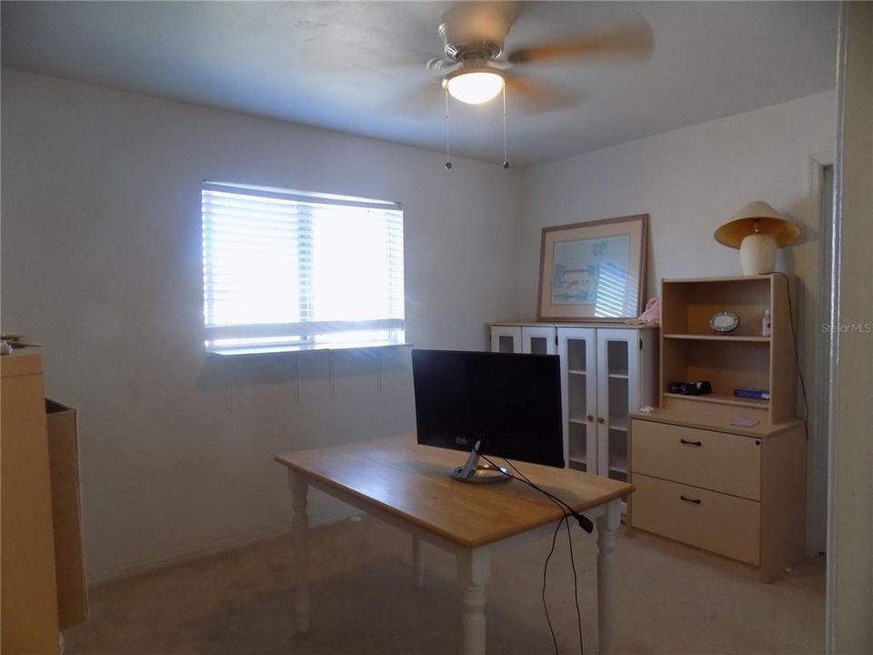 Bedroom #1. Large window allowing for plenty of light.