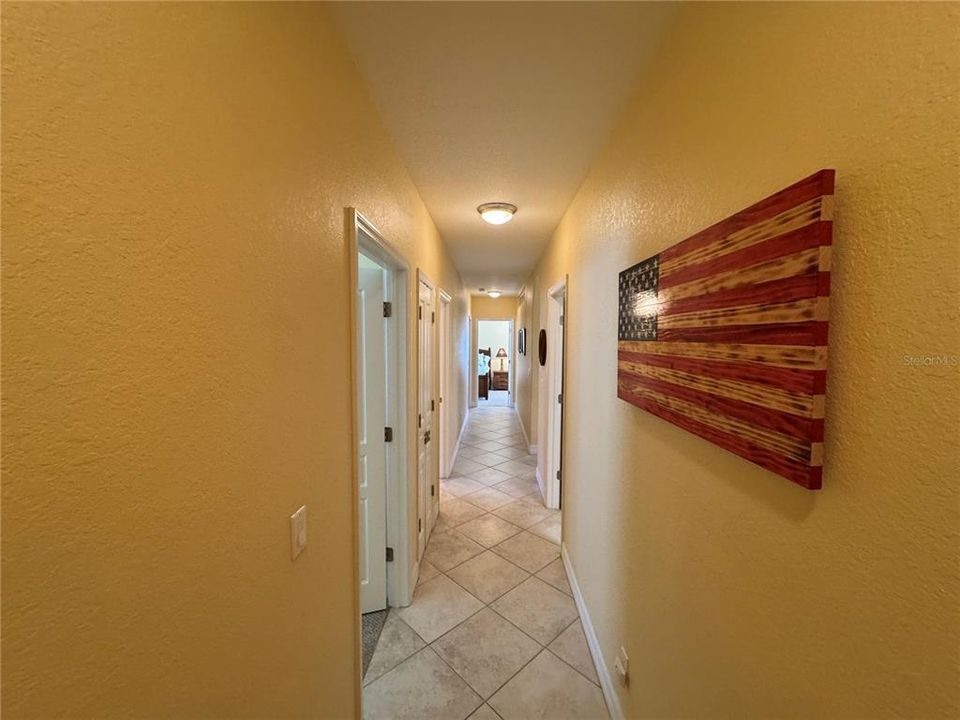 Hallway to the 3 guest bedrooms and laundry room