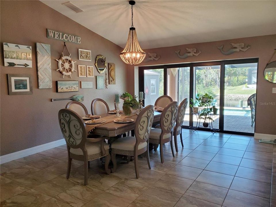 Open Floor Plan Dining Room wth Porcelain Tile Throughout the Entire Home