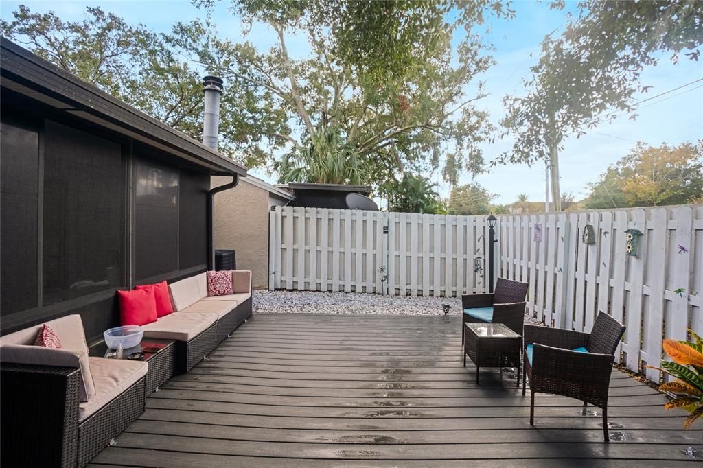 NEW outdoor private deck. Fresh painted white fence for privacy.