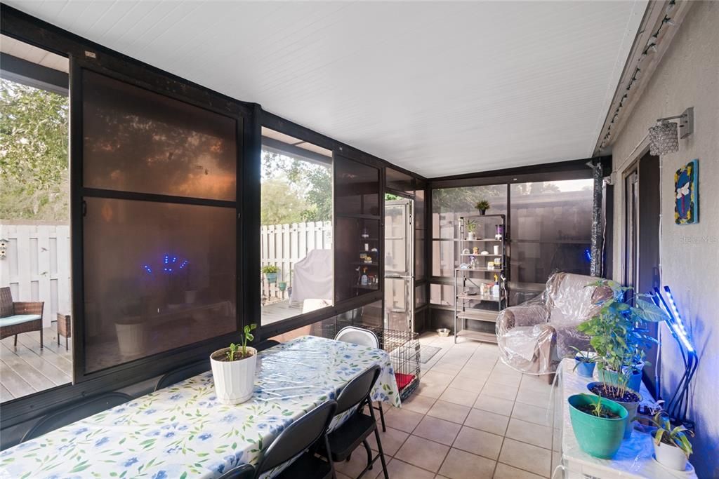 Screened insulated lanai with AC split and access to NEW deck. Tile throughout. New dog door installed.